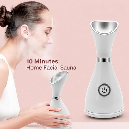 Minimalist close-up of a white nano facial steamer on white background